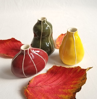 Bud vase group, autumn colors