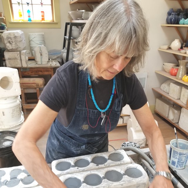 woman working in ceramic studio